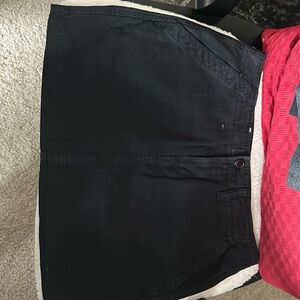 Black jeans, mini skirt